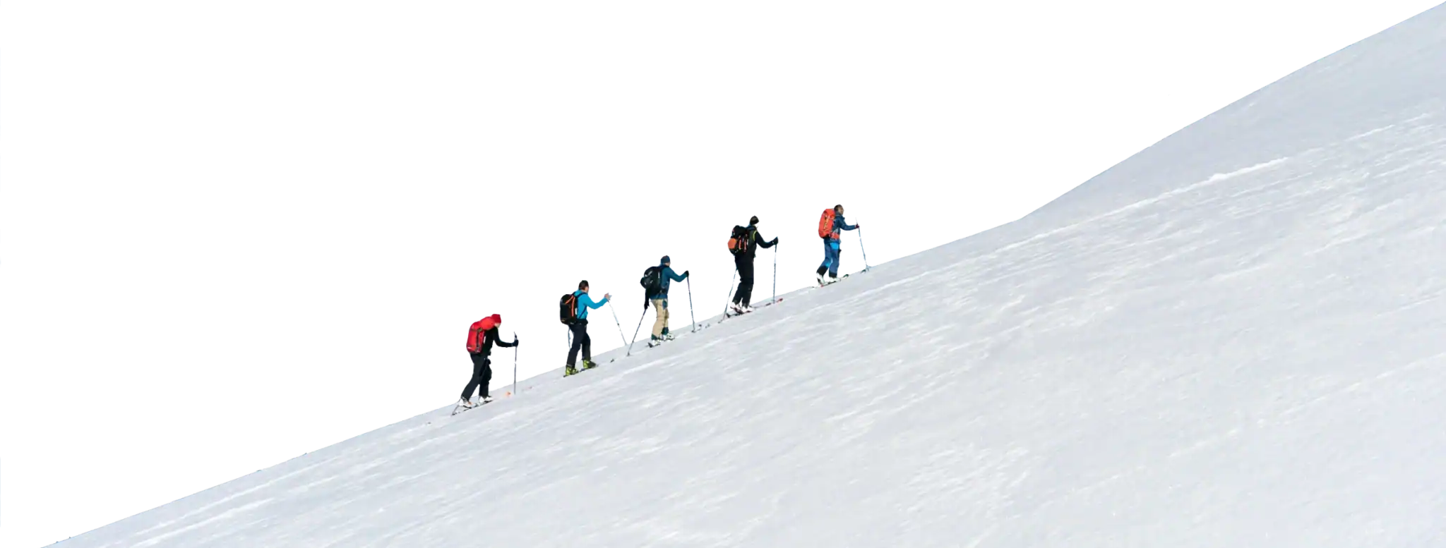 Climbers roped together ascending a snowy ridge